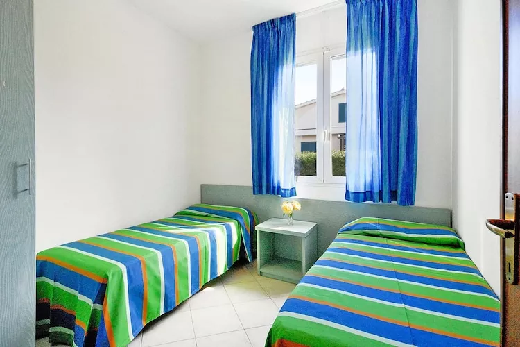 Ferienanlage La Cecinella Villaggio Turistico Cecina Mare Typ Trilo  F Villette GINEPRO-Slaapkamer