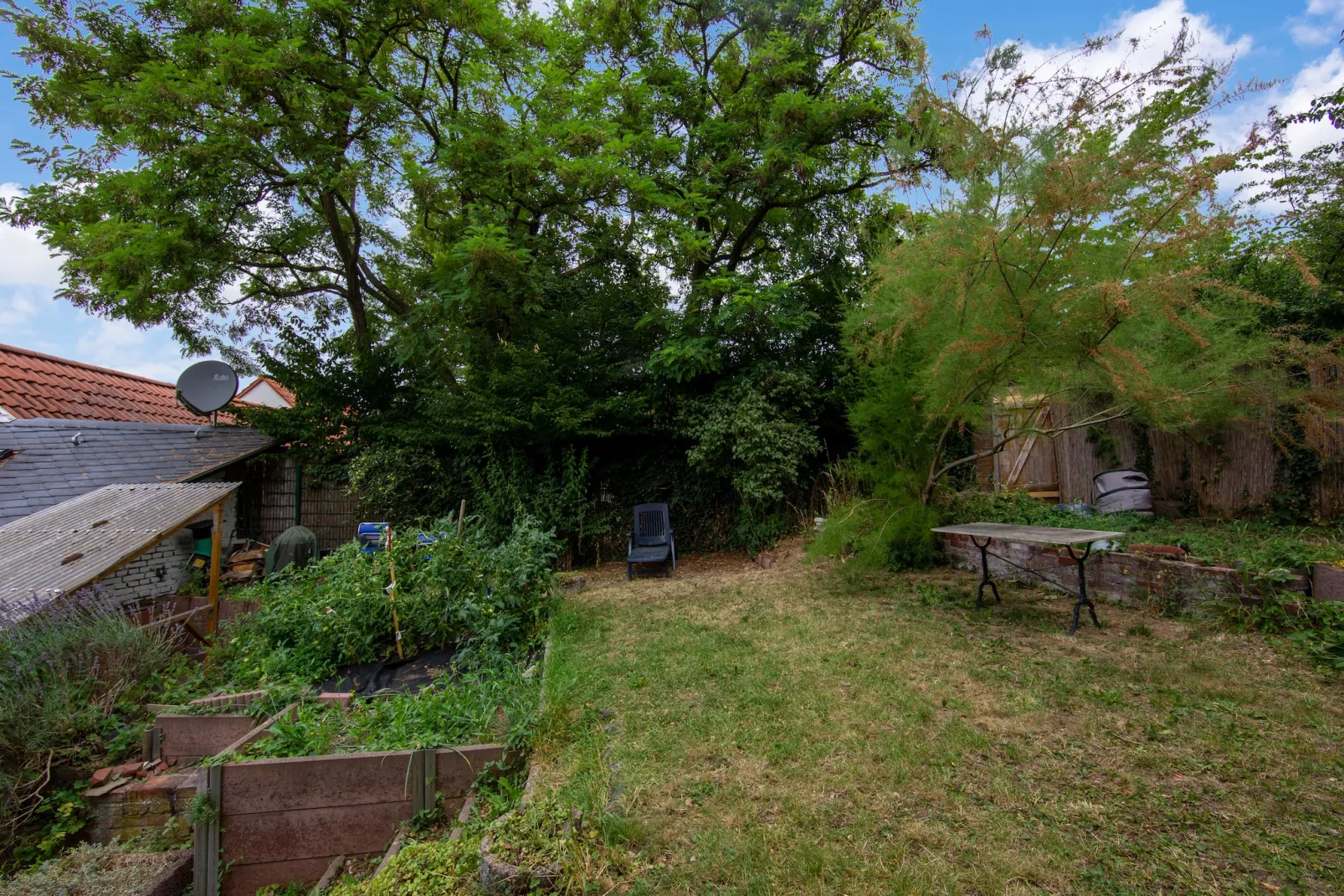 Maisonette im Taunus mit mediterrane Terrasse-Tuinen zomer