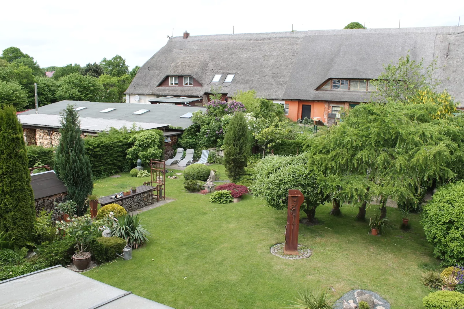 Strandnahe Ferienwohnung Betty mit großem Garten-Buitenkant zomer