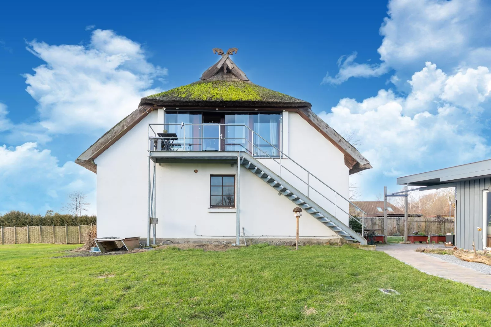 Ferienhaus am Peenebach in Klein Bünzow-Buitenkant zomer