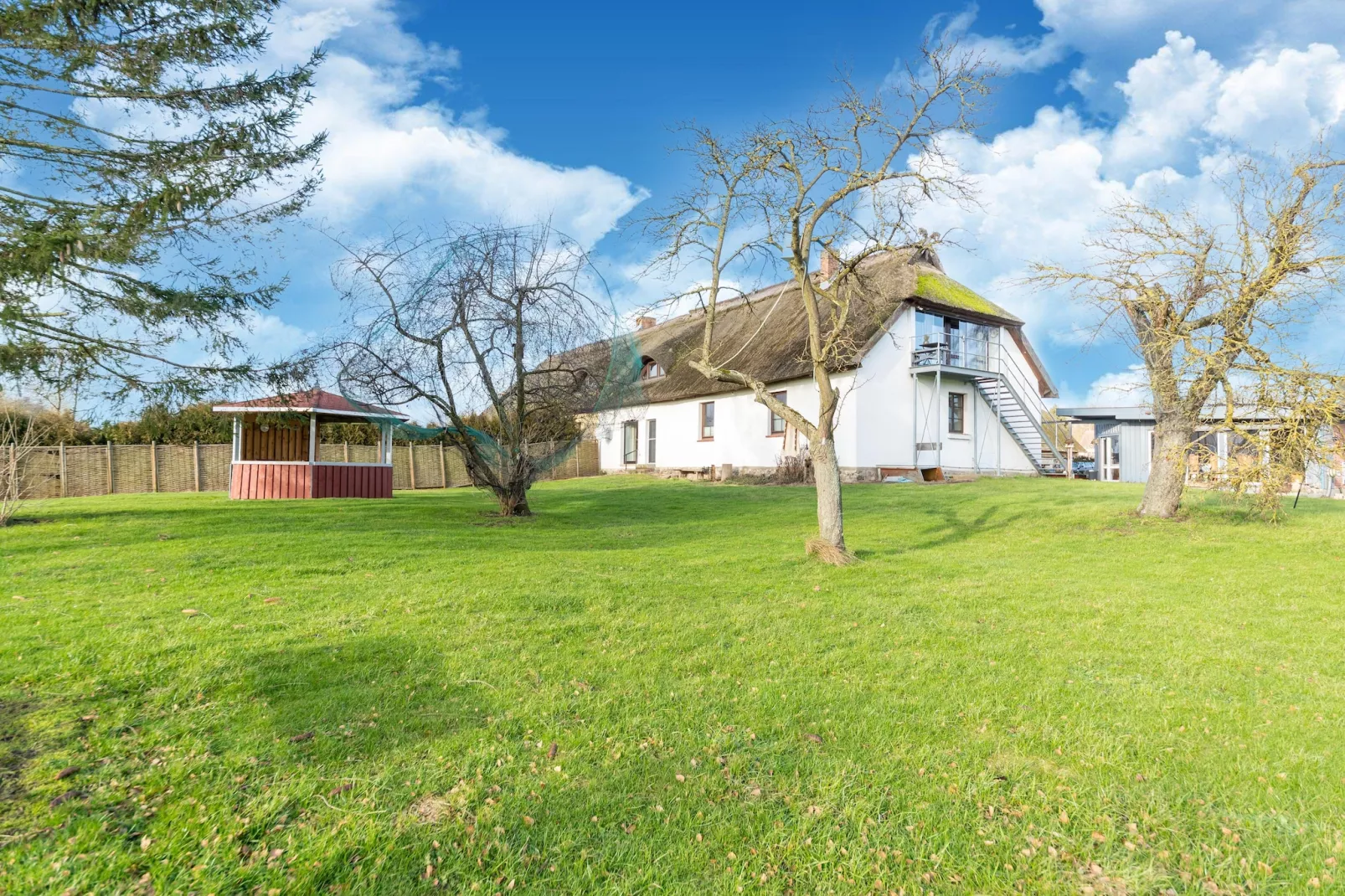 Ferienhaus am Peenebach in Klein Bünzow-Tuinen zomer