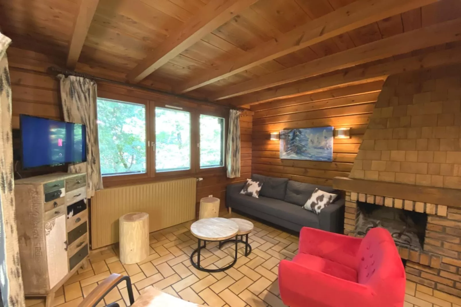 LE MONTAGNARD Chalet en bois-Woonkamer