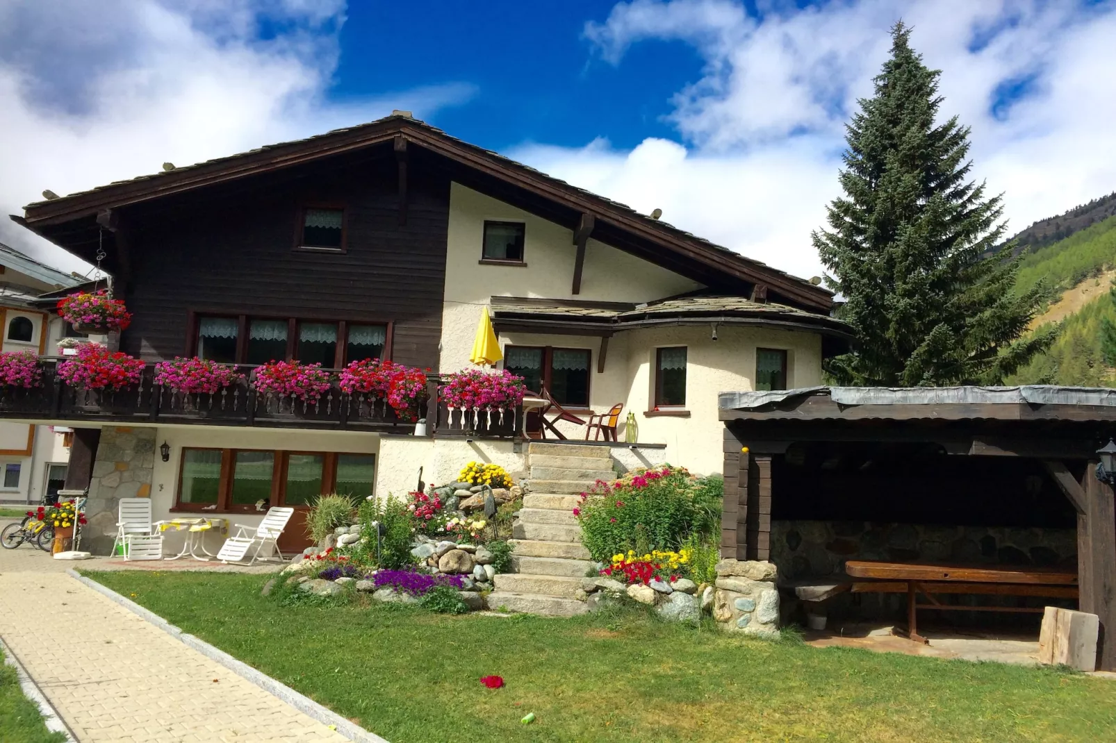 Chalet Sunstar kleine Wohnung-Buitenkant zomer