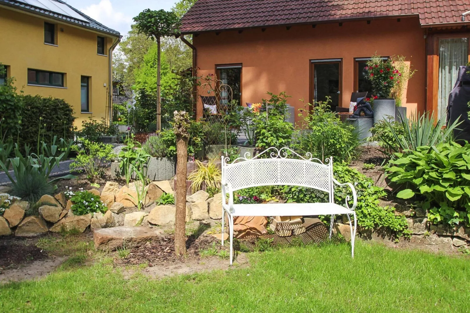 Doppelhaushälfte mit Sonnenterrasse-Tuinen zomer