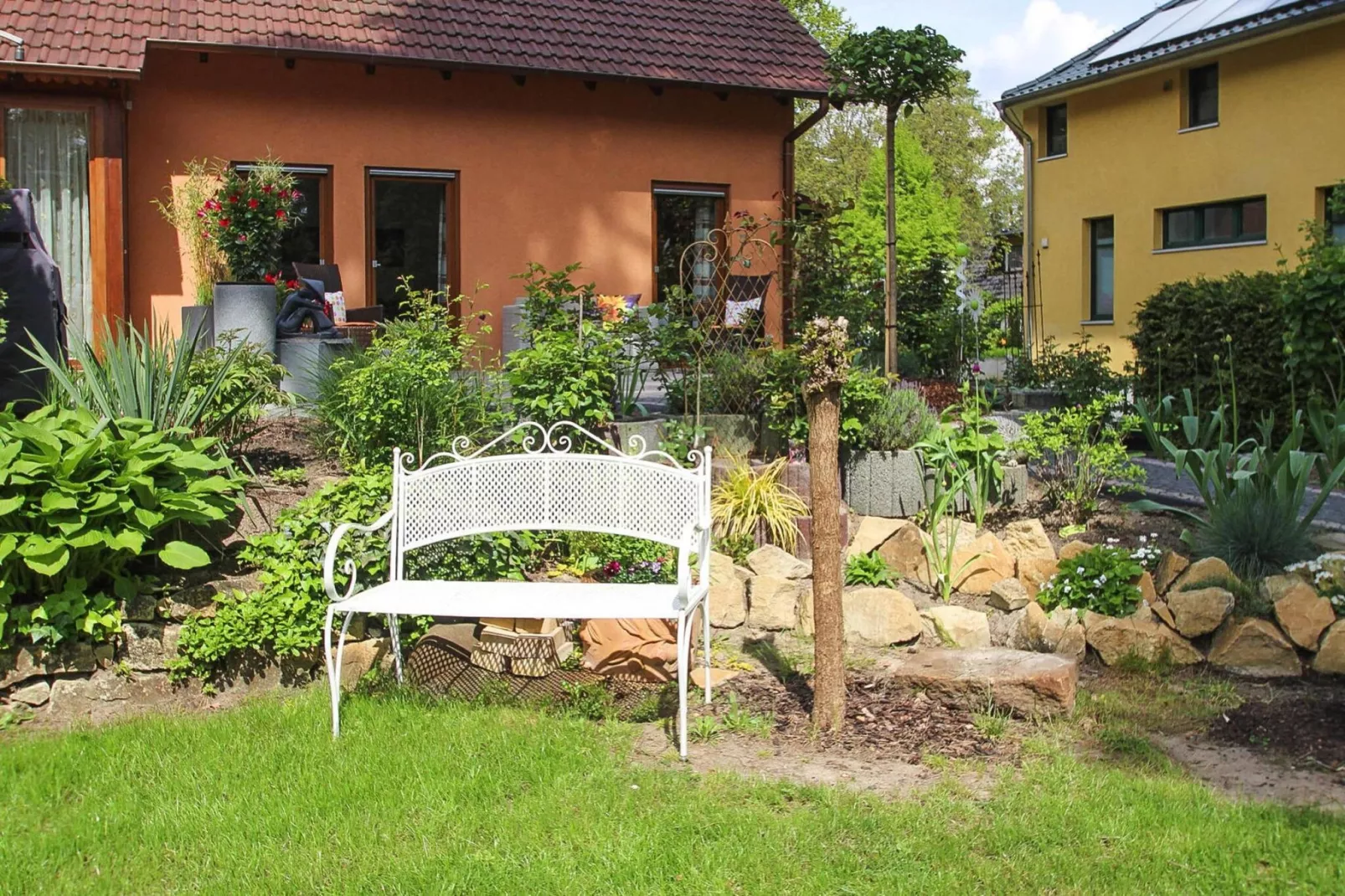 Doppelhaushälfte mit Sonnenterrasse-Tuinen zomer