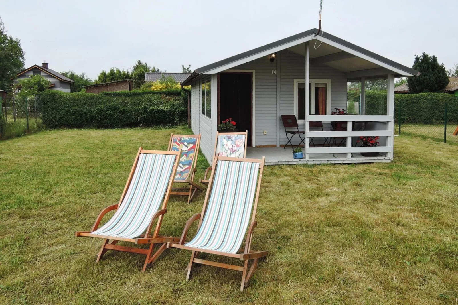 Bungalow Pod wrzosem Wrzosowo-Buitenkant zomer