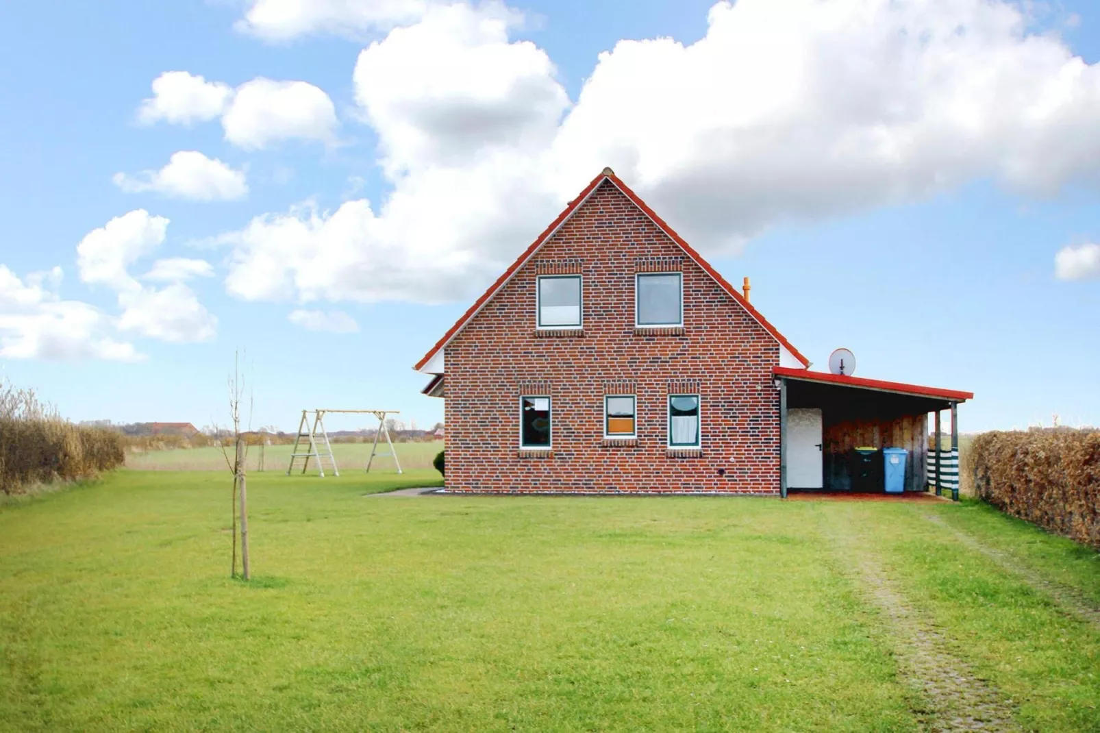 Großes Ferienhaus am Deichtor in Neßmersiel-Buitenkant zomer