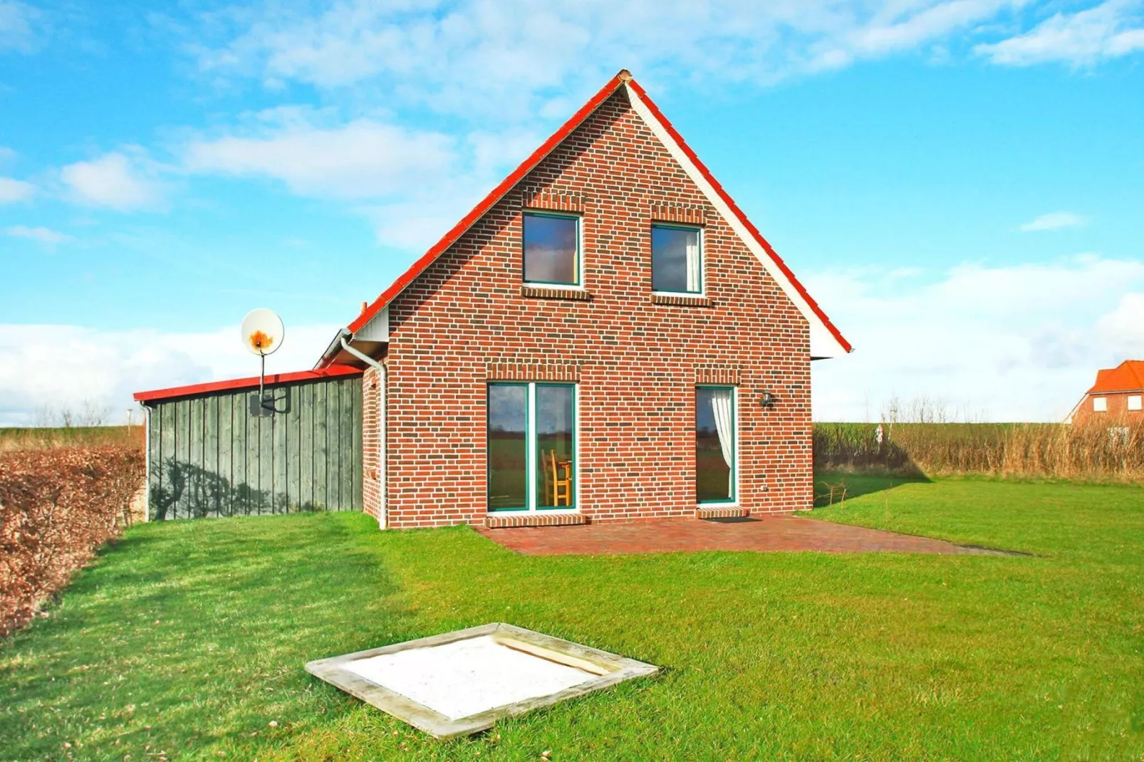 Großes Ferienhaus am Deichtor in Neßmersiel-Buitenkant zomer