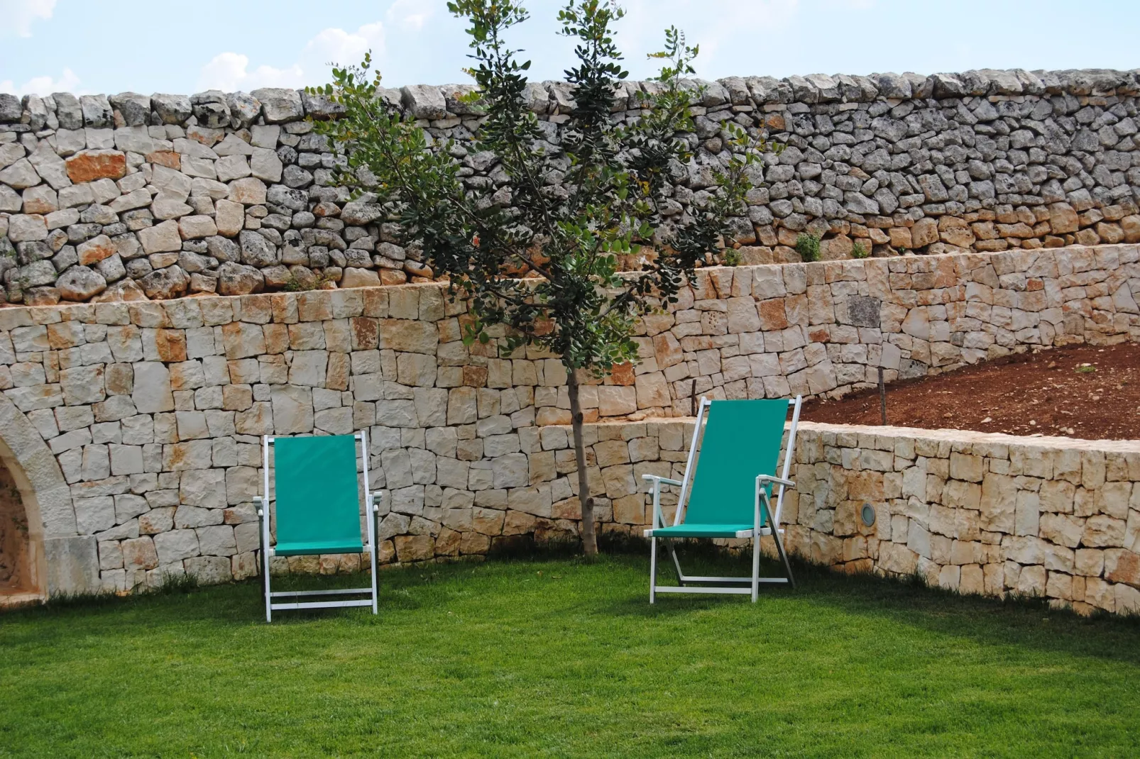 Trullo Amato Cisternino-Tuinen zomer