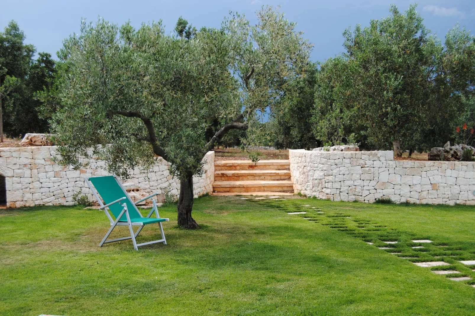 Trullo Amato Cisternino-Tuinen zomer