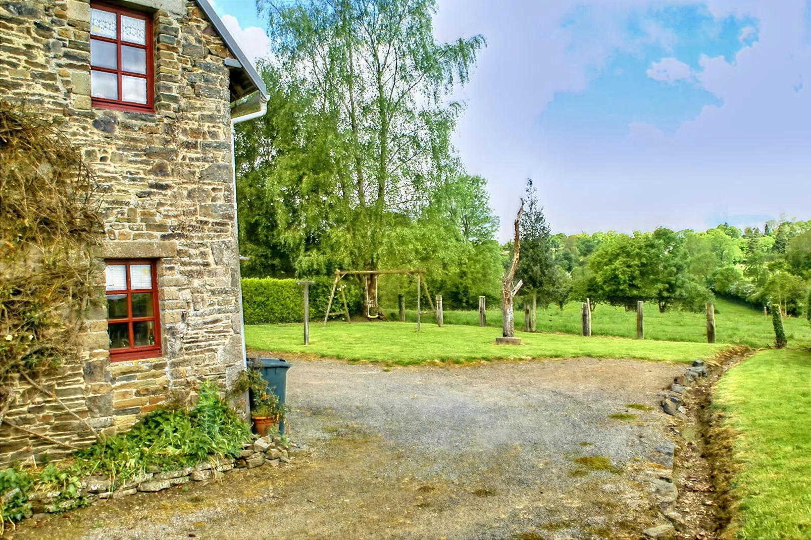 Maison de vacances Montaigu les Bois-Tuinen zomer