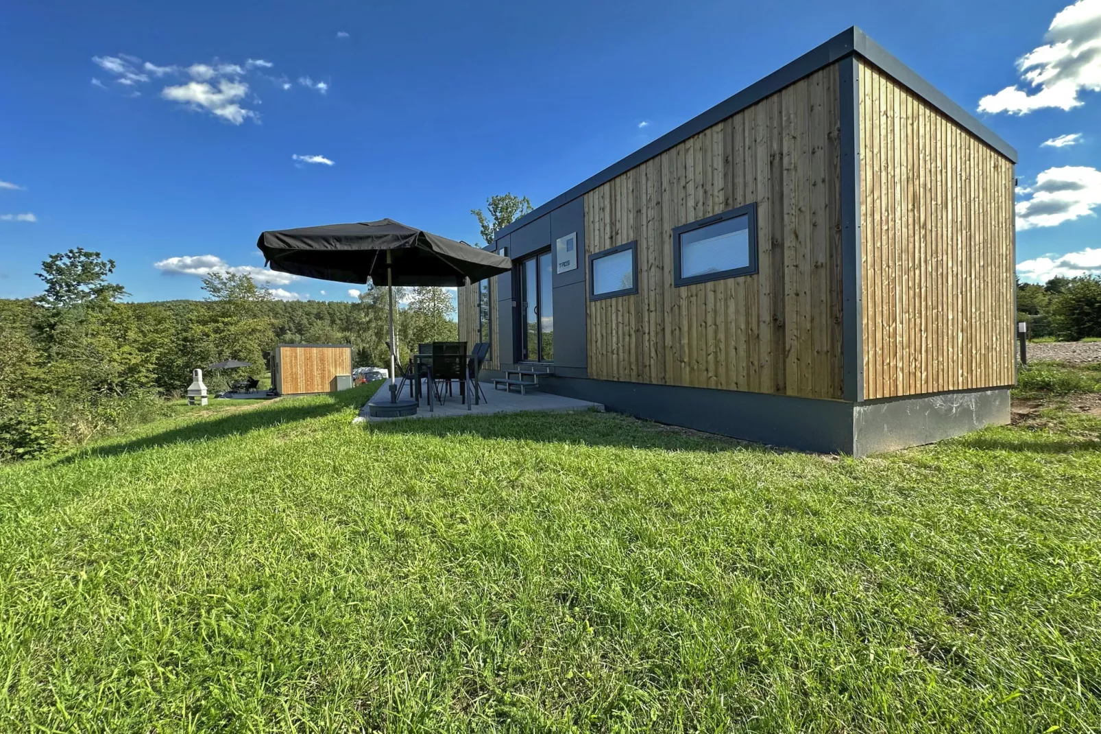 FERIENDORF SEEBLICK - Tiny Chalet am Eixendorfer See-Buitenkant zomer