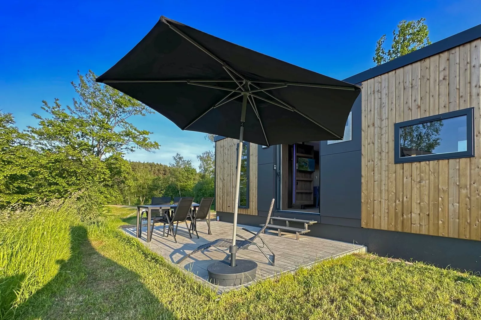 FERIENDORF SEEBLICK - Tiny Chalet am Eixendorfer See-Buitenkant zomer