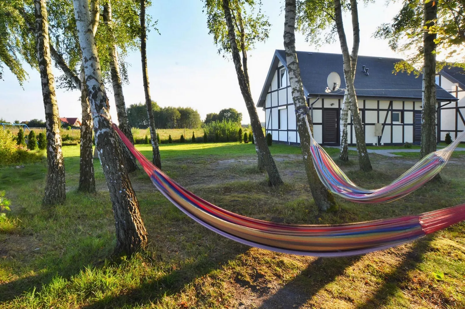 Piętrowy dom wakacyjny z tarasem 40 m2 dla 5 osób Jarosławiec-Tuinen zomer