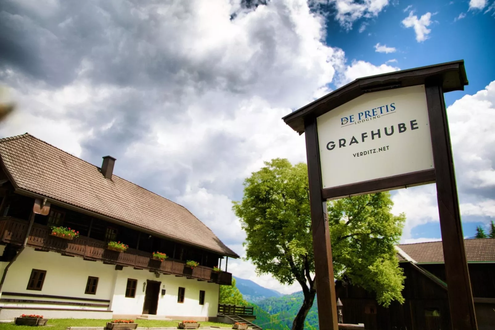 Grafhube Appartements - ganzes Haus-Buitenkant zomer