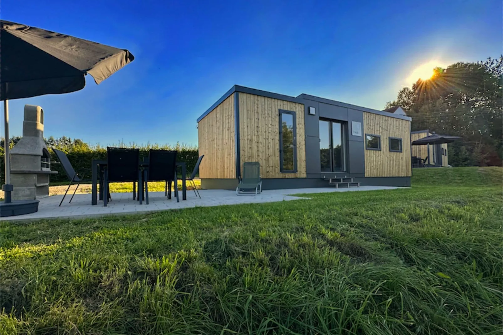 FERIENDORF SEEBLICK - Tiny Chalet am Eixendorfer See-Buitenkant zomer