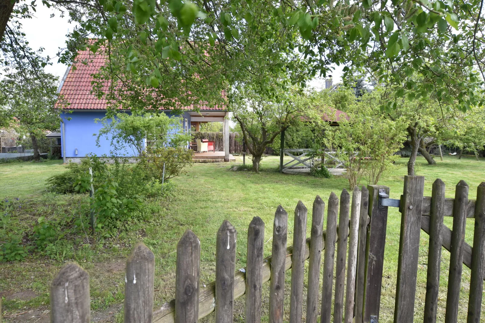 Ferienhaus am Haff-Tuinen zomer