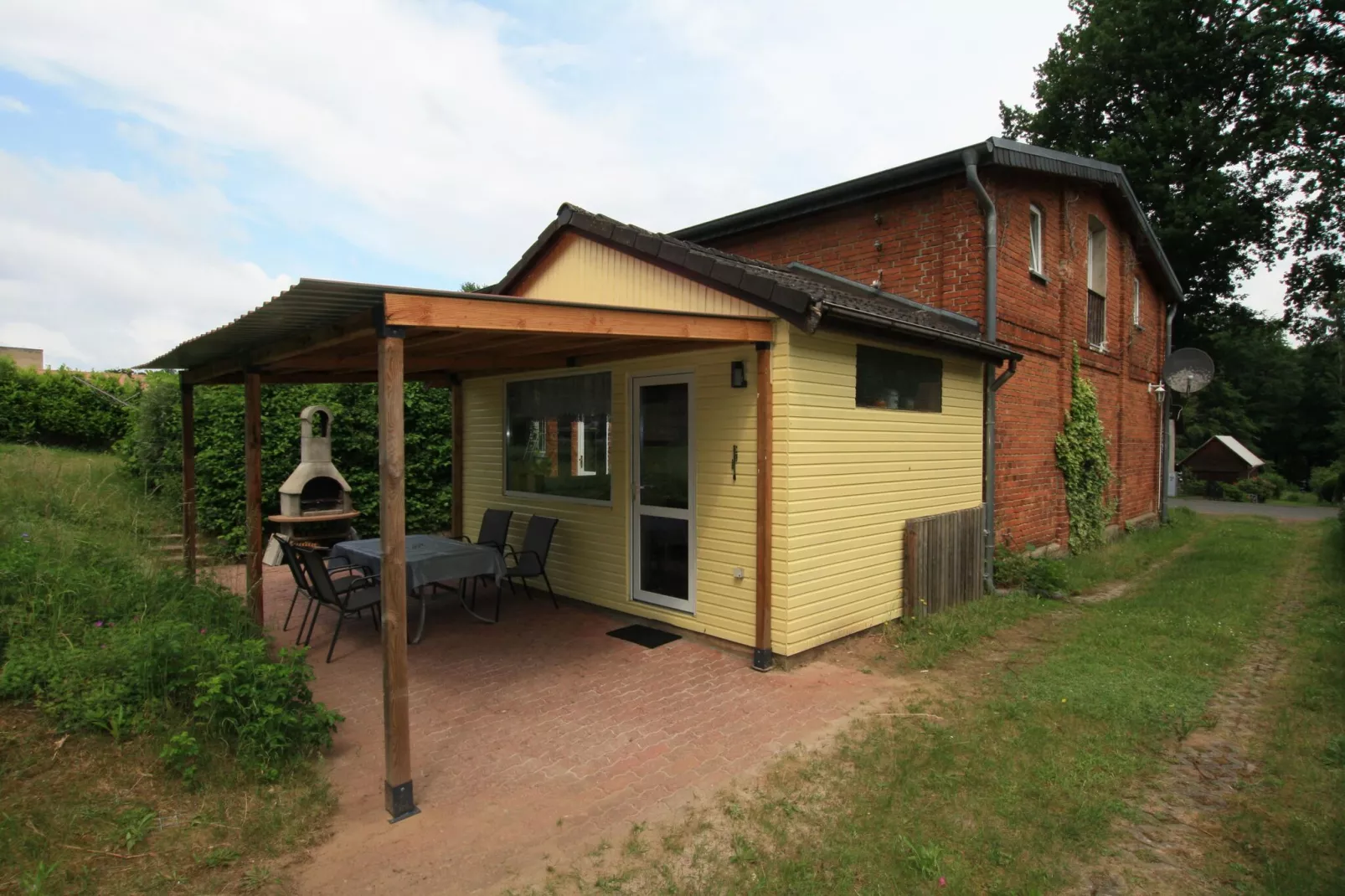 Ferienhaus am Petersdorfer See-Buitenkant zomer