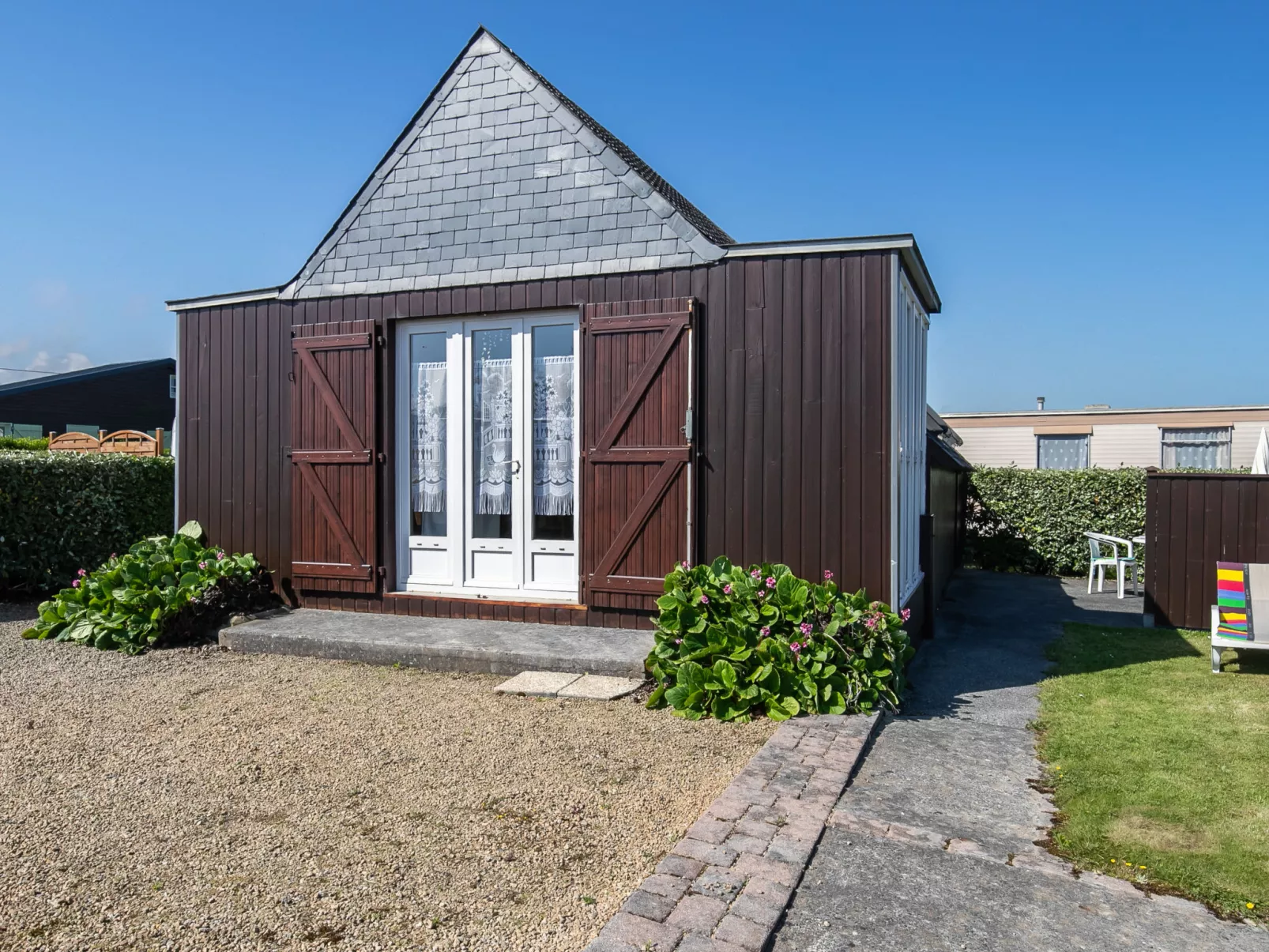 Petit Chalet à la Plage-Buiten