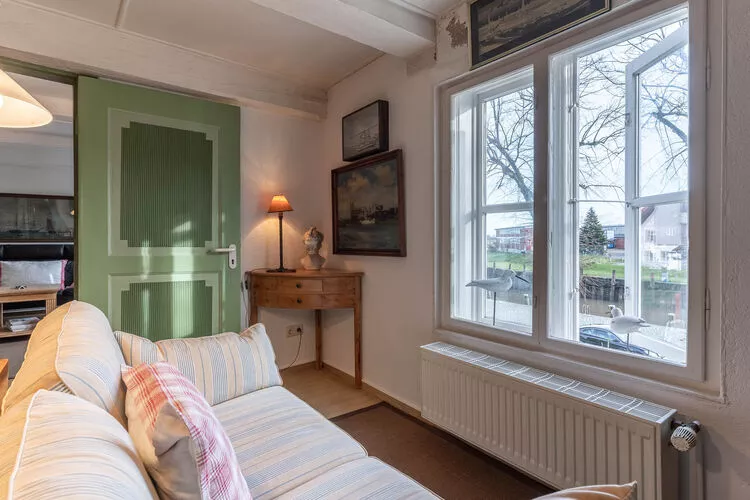 Ferienwohnung HafenPeerle-Woonkamer