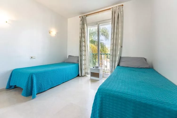 CT 281 - Faro's Fairways Apartment - Caribplaya-Slaapkamer