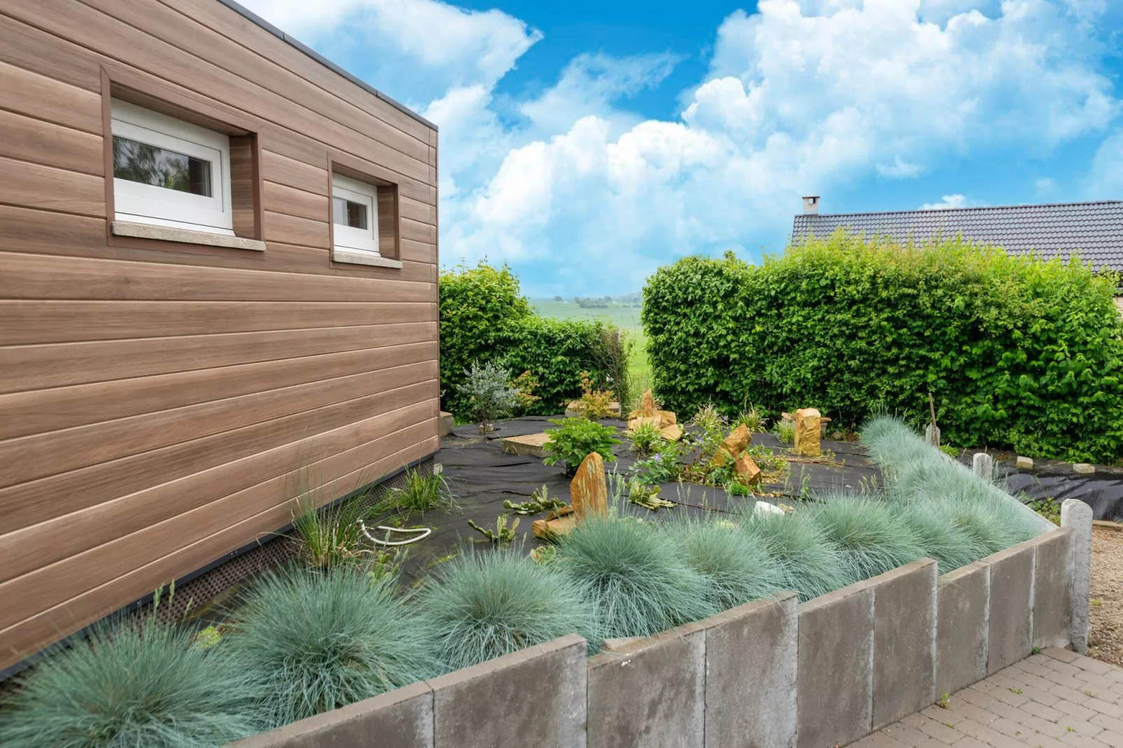 Gite à la ferme avec Piscine intérrieur  sauna et bains à remous-Tuinen zomer