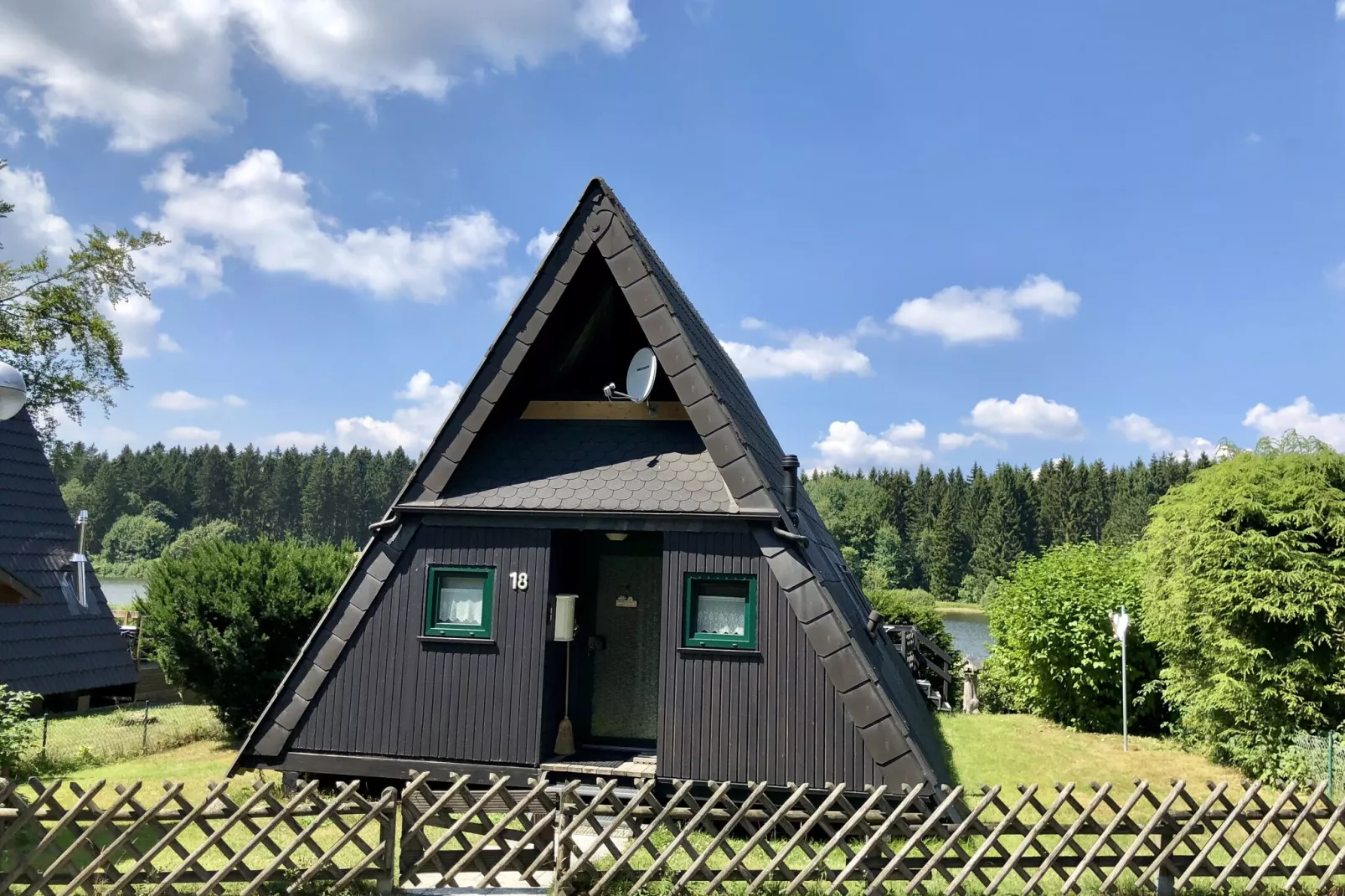 Typ A -  Nurdachhaus - mit Haustier-Buitenkant zomer