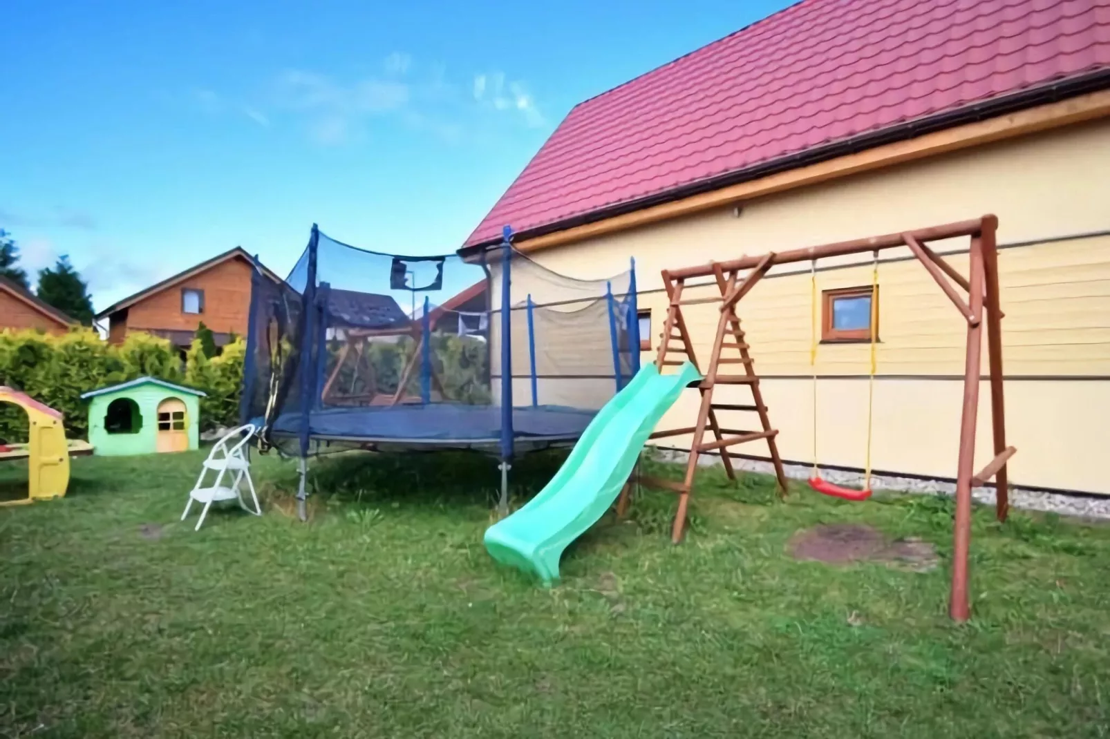 Domki wakacyjne VENA dla 7 osób Sarbinowo-Tuinen zomer