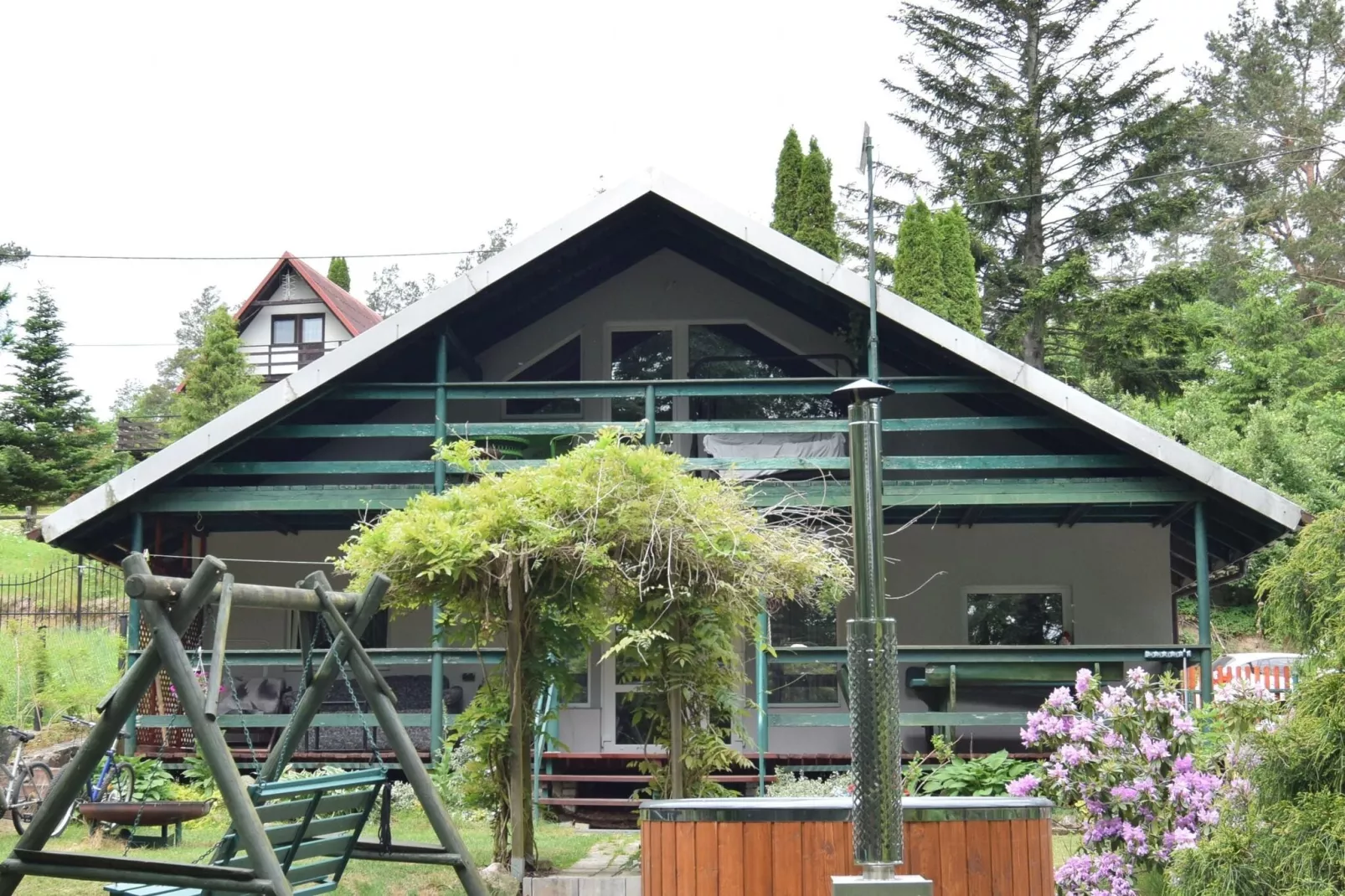 Holiday Home with whirlpool at the lake in Zakowo-Buitenkant zomer