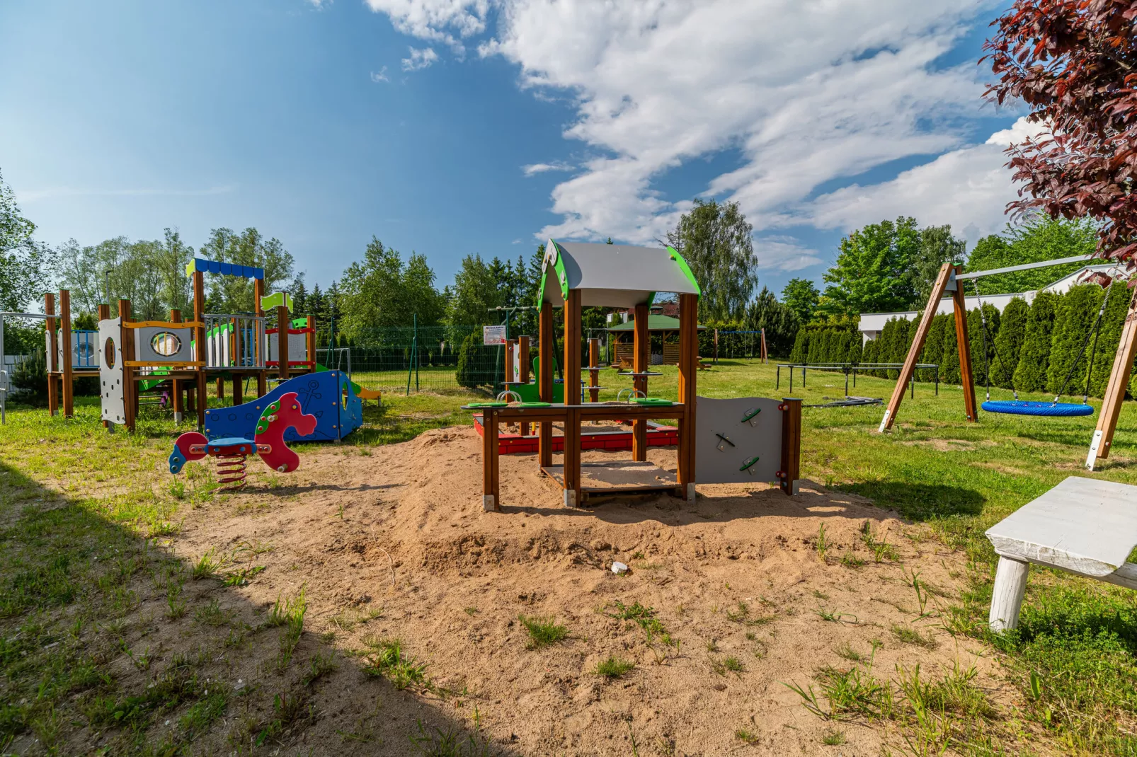 Boski Raj domki letniskowe Sianożąty-Tuinen zomer