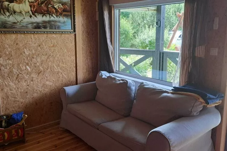 Holiday home in Dobrogoszcz-Woonkamer