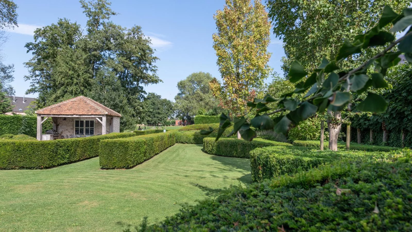 Villa Deluxe-Tuinen zomer