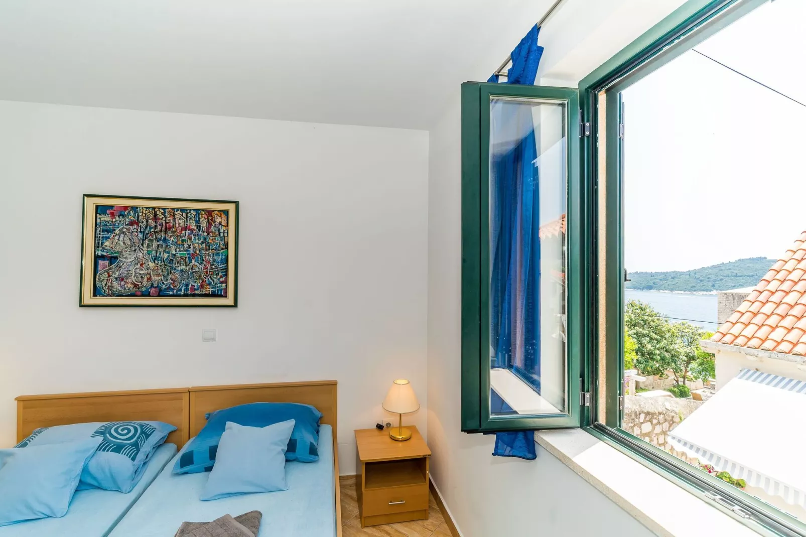 Apartments Casa Vanna - One-Bedroom Apartment with Terrace and Sea View-Slaapkamer