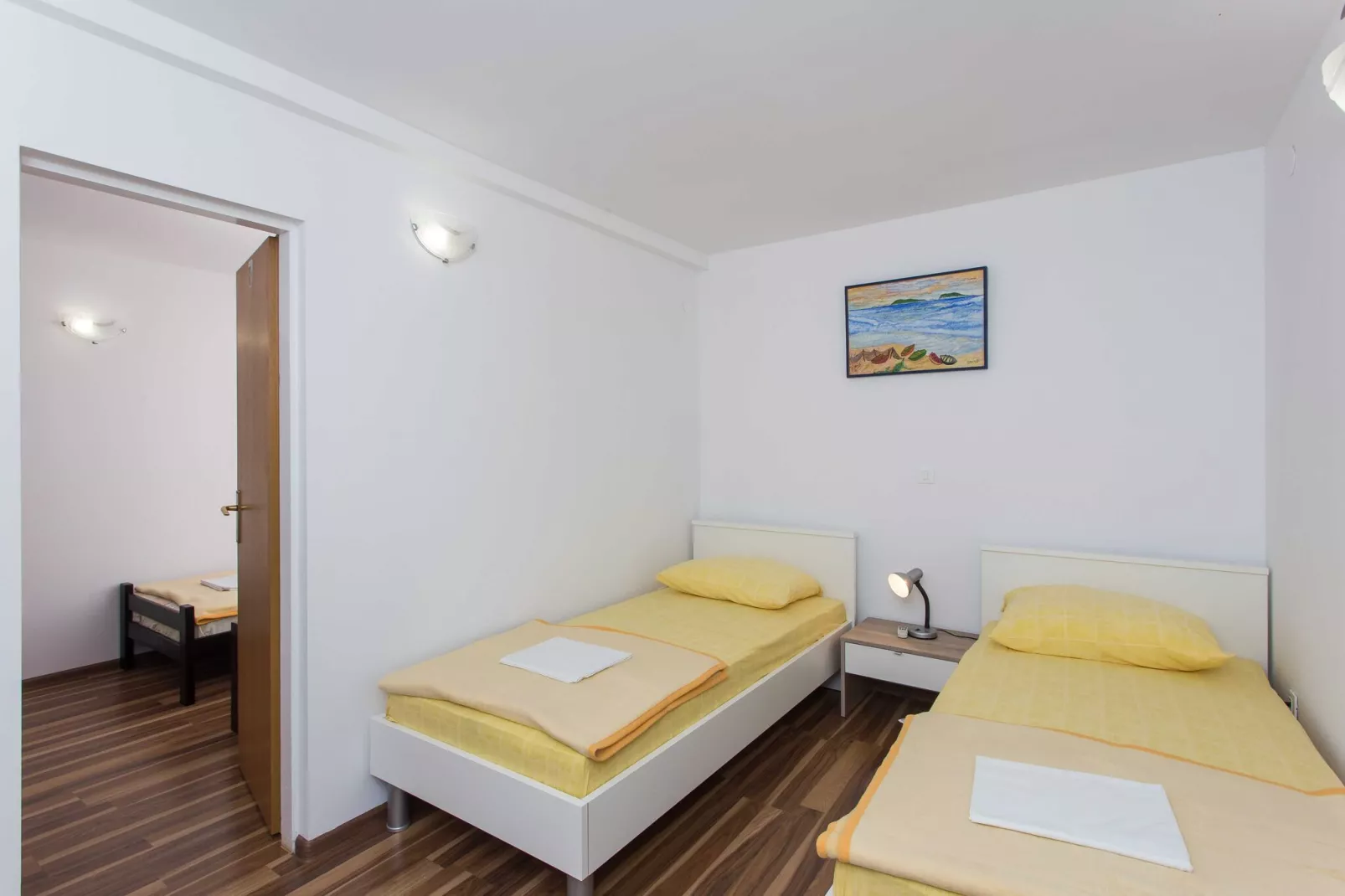 Apartments Djurkovic - Two-Bedroom Apartment with Shared Terrace and Sea View-Slaapkamer