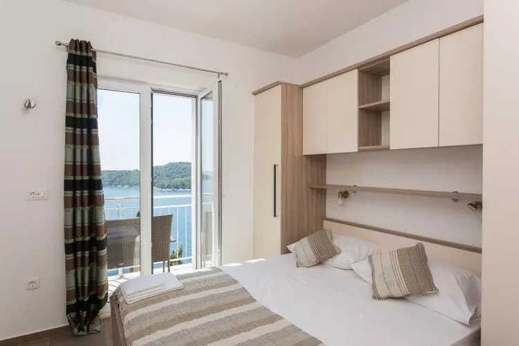 Apartments Villa Ari - Deluxe Three Bedroom Apartment with Balcony and Sea View (Second Floor)-Slaapkamer