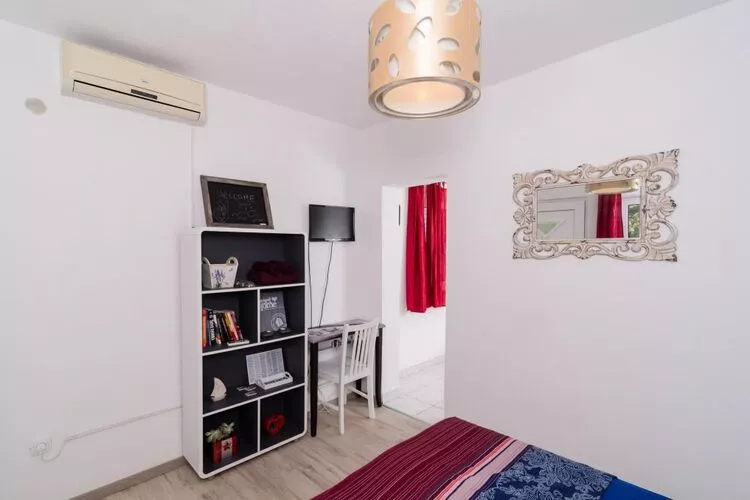 Apartments Ammos - One Bedroom Apartment with Shared Terrace and Sea View (Mali)-Slaapkamer