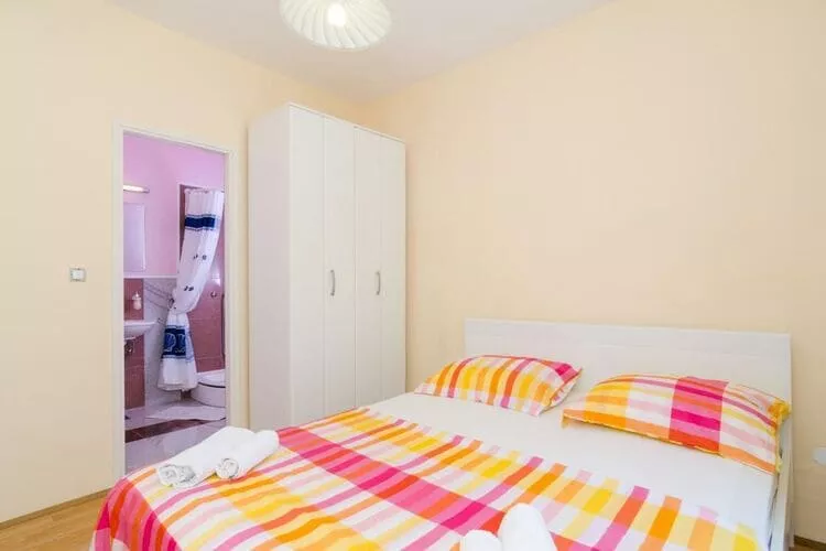 Apartments & Rooms Tapera- Comfort One-Bedroom Apartment with Terrace and Garden View ( NARANČASTI 1 )-Slaapkamer