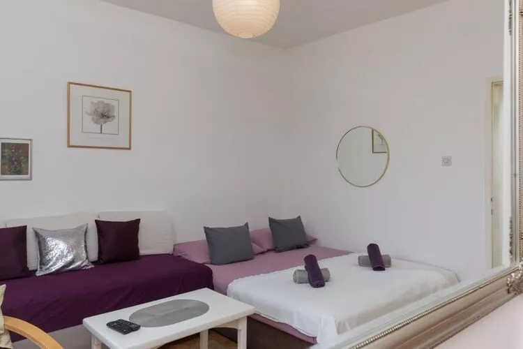 Apartment Purple Rain - Studio Apartment with Terrace and Sea View-Woonkamer