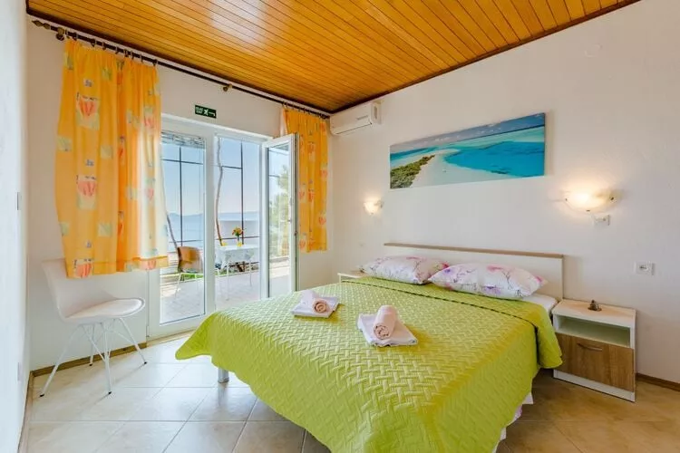 Rooms Sani - Double Room with Terrace and Sea View (S3)-Slaapkamer