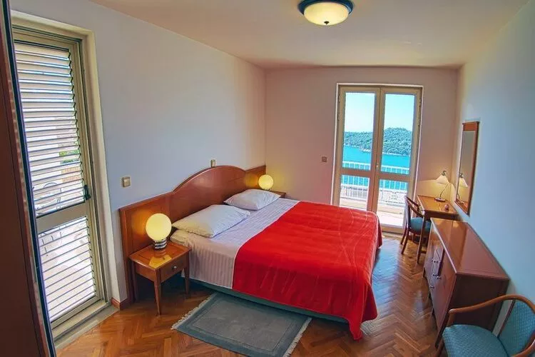 Apartments Sipa - Comfort Two Bedroom Apartment with Balcony and Sea View (Apartman B)-Slaapkamer