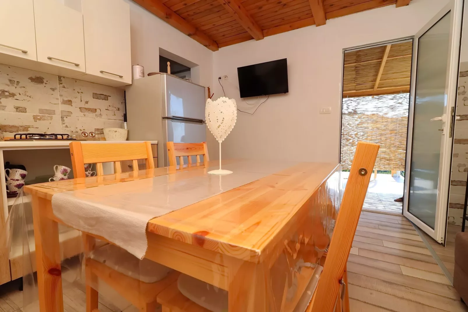 Greenside Cottage Lumi-Two Bedroom Holiday Home with Terrace and Sea view-Eetkamer