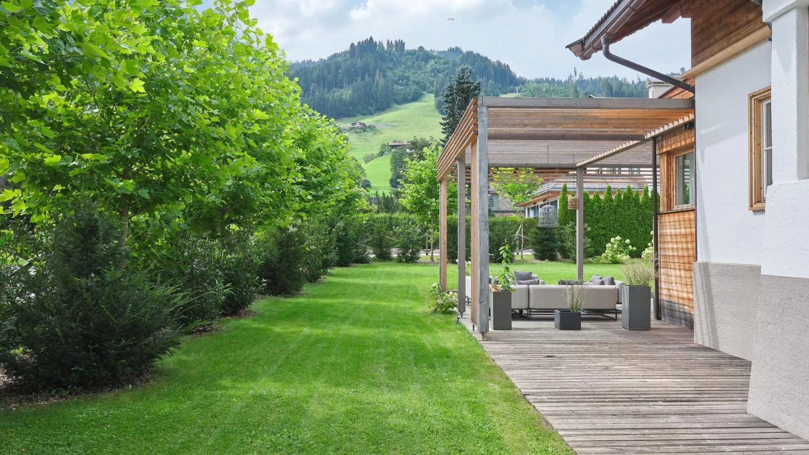 Stadtchalet Forsthaus-Tuinen zomer