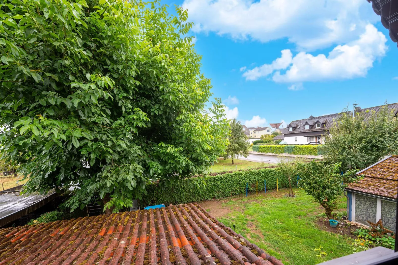 Ferienwohnung zum Zaubergarten-Uitzicht zomer