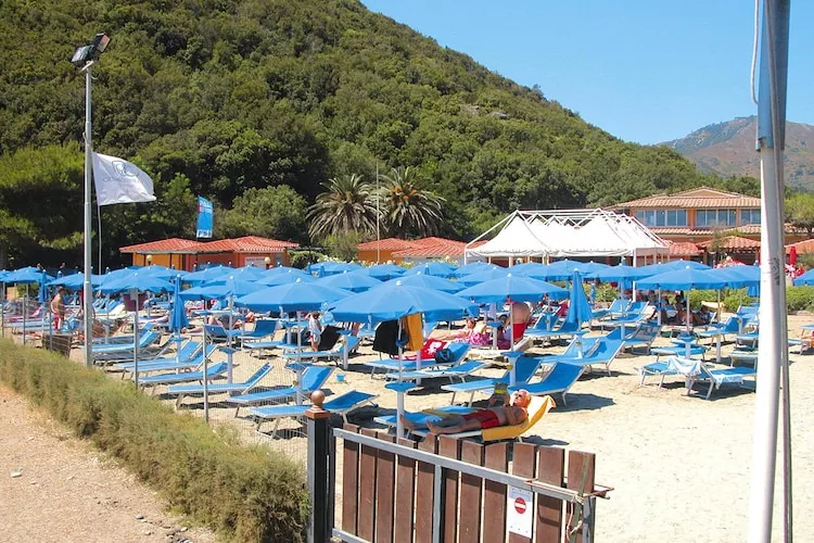 Holiday resort TH Ortano Mare Village & Residence Rio Marina-Bilo 4-Le Ville -piano terra-Buitenkant zomer