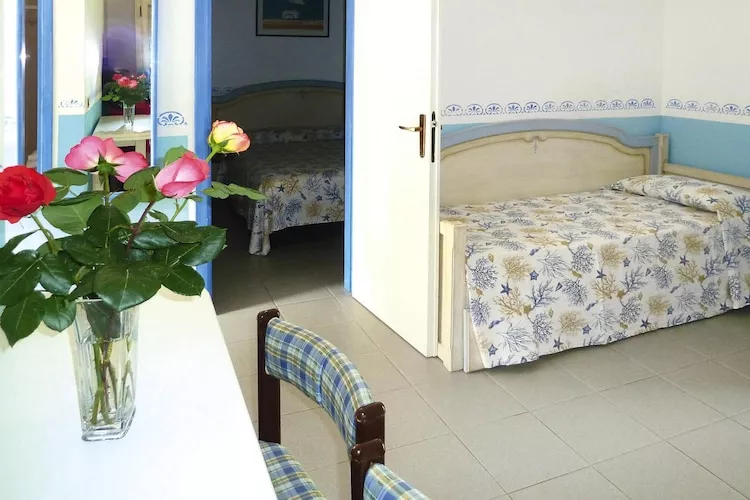 Holiday resort TH Ortano Mare Village & Residence Rio Marina-Bilo 4-Le Ville -piano terra-Slaapkamer