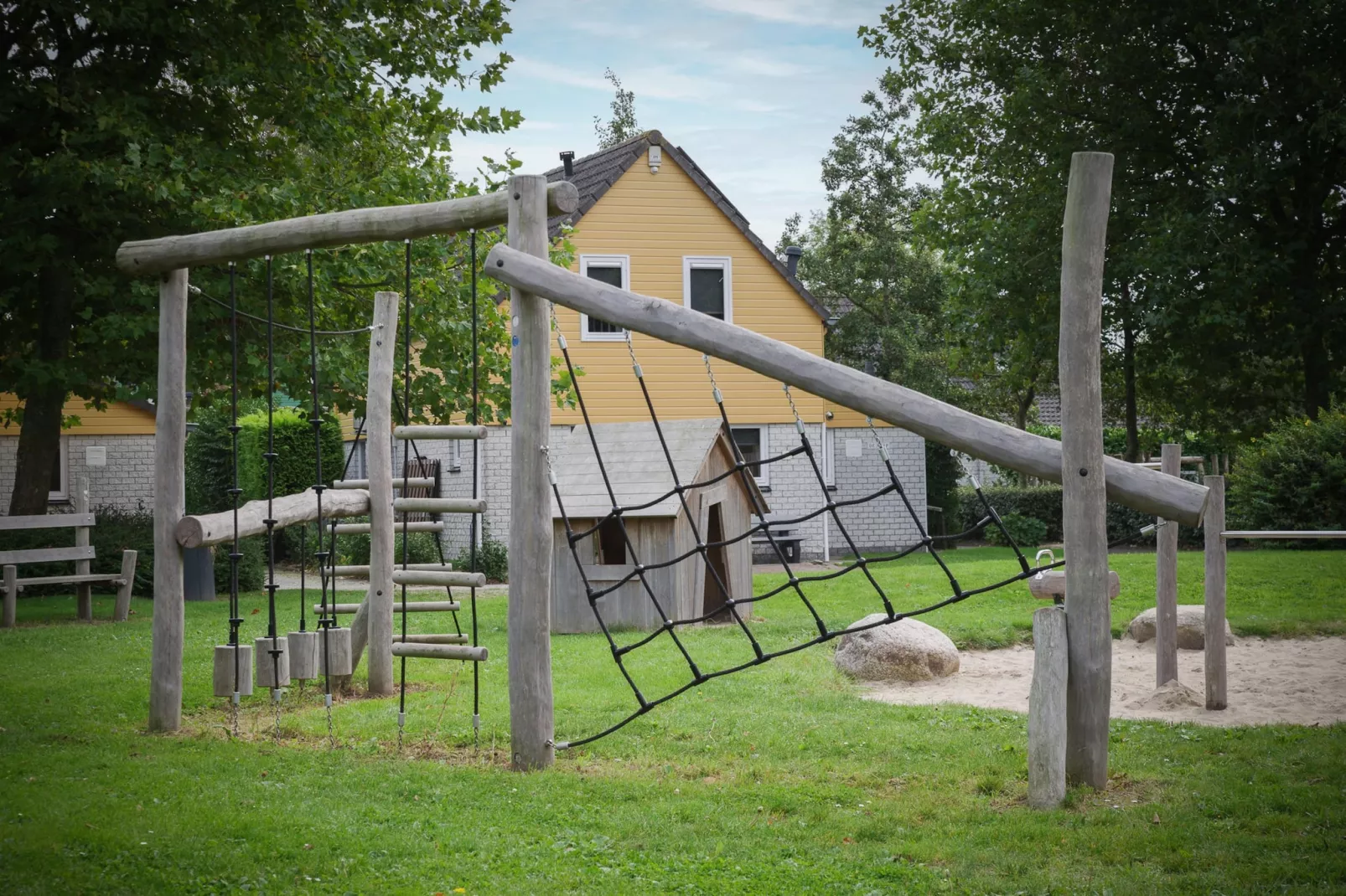 Villapark De Oesterbaai 74-Tuinen zomer