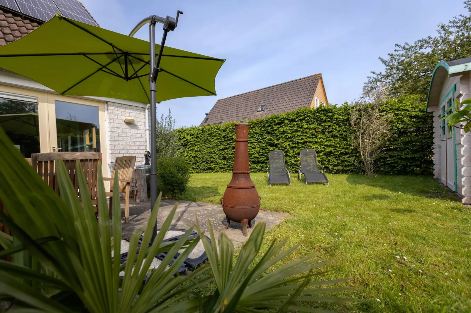 Villapark De Oesterbaai 39-Tuinen zomer