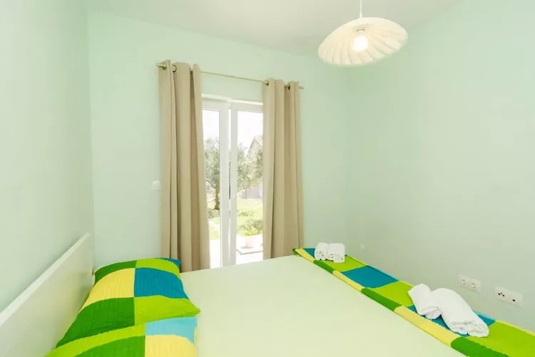 Apartments & Rooms Tapera- Standard One Bedroom Apartment with Terrace and Garden View ( ZELENI 2 )-Slaapkamer