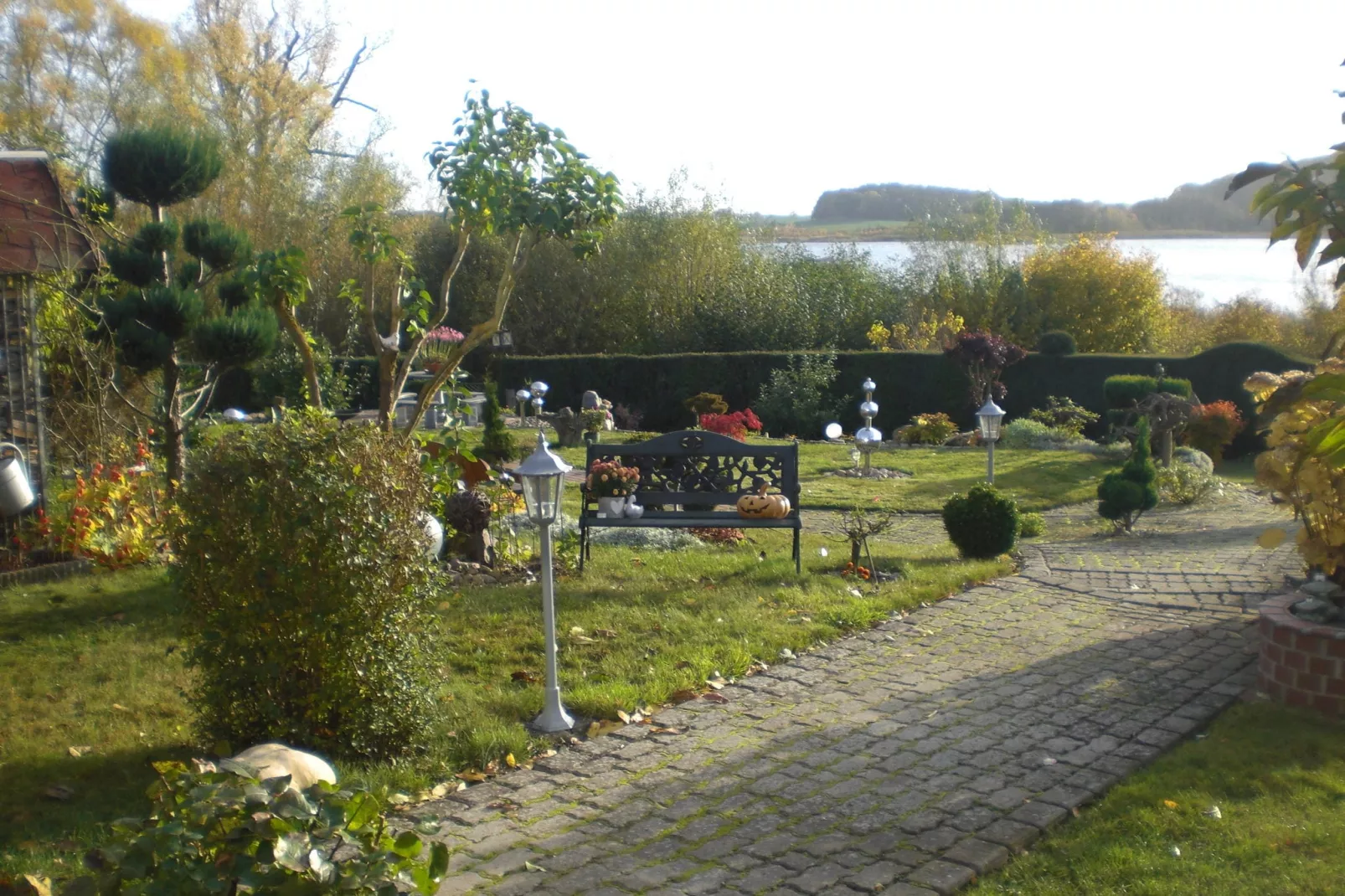 Das Haus Am See mit Kamin und eigenem Boot-Tuinen zomer