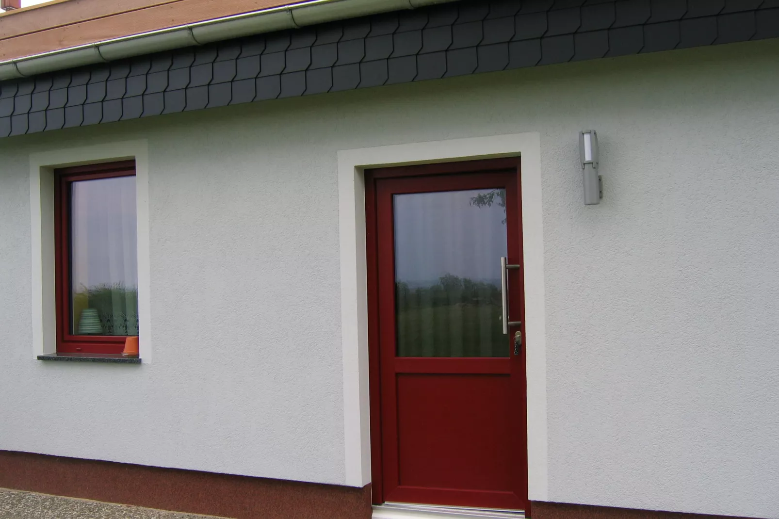 Ferienwohnung mit Meerblick-Buitenkant zomer